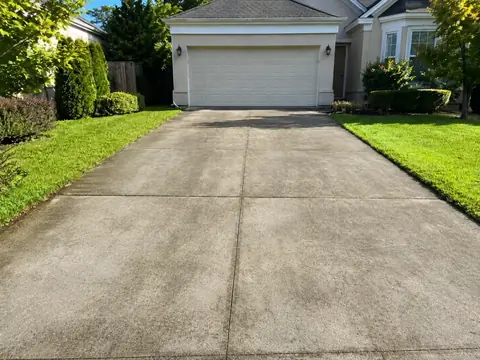 Driveway before pressure washing